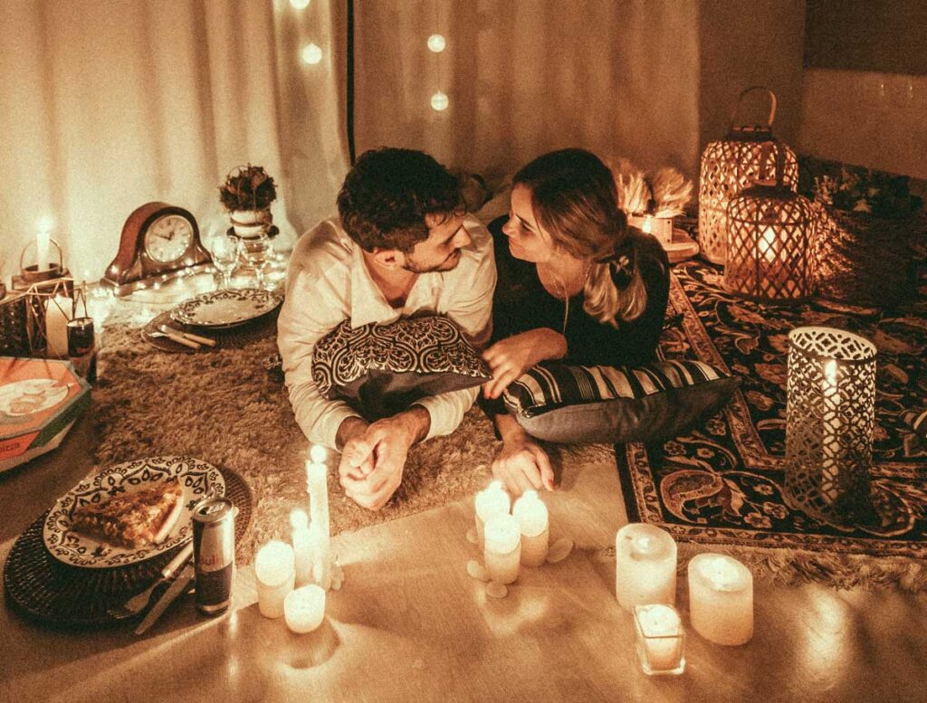 December proposal couple in a cosy setting at home