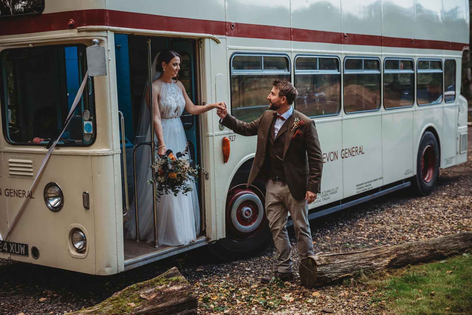 Bride & groom with a vintage bus at their wedding with Tara the Celebrant