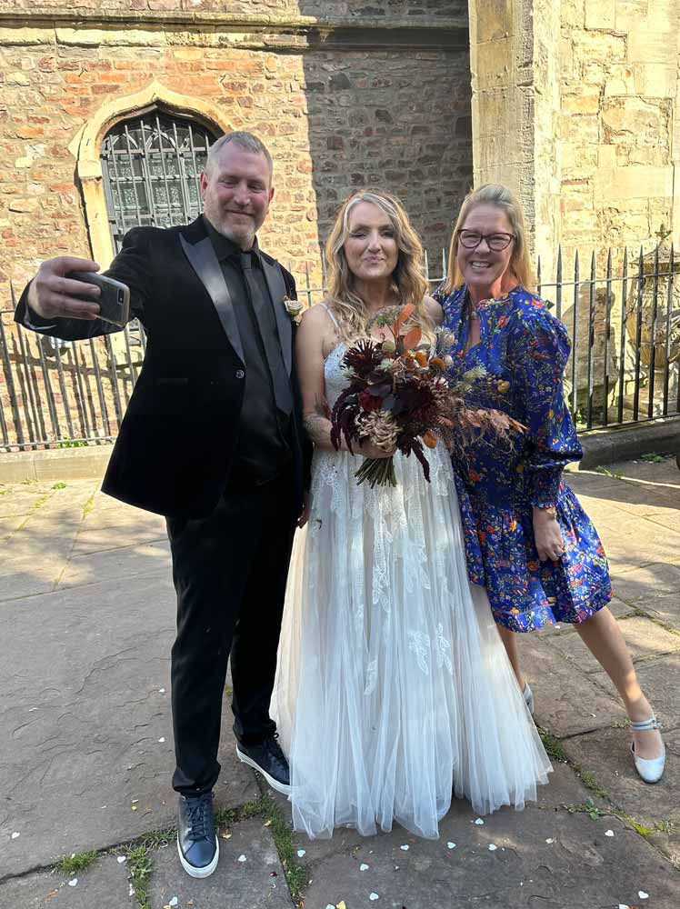 A bride and groom with Tara the Celebrant at their celebrant-led wedding in Bristol