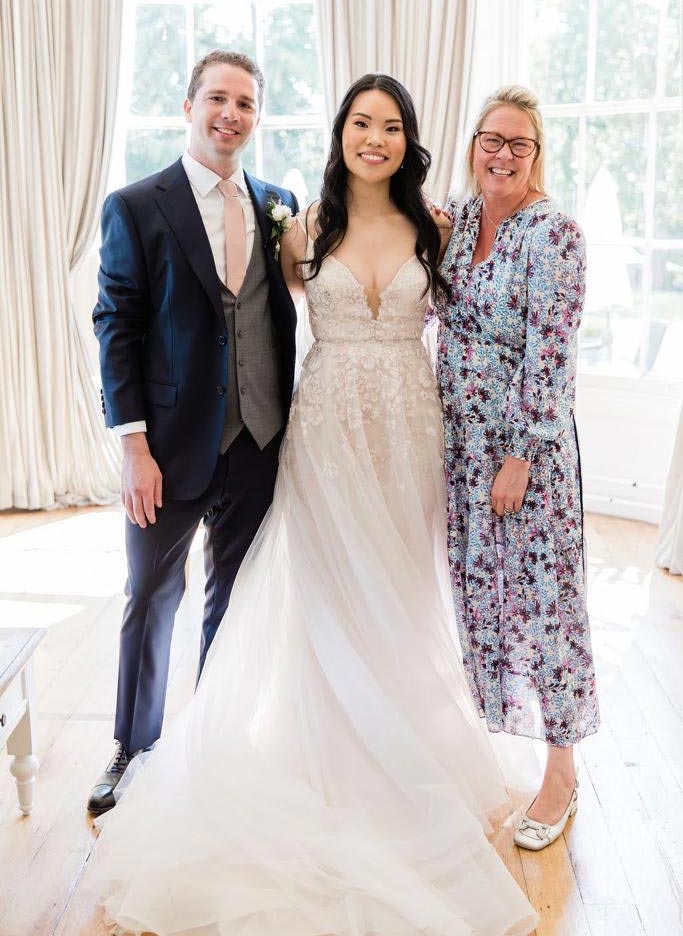 A delighted bride and groom with Tara the Celebrant at their celebrant-led wedding